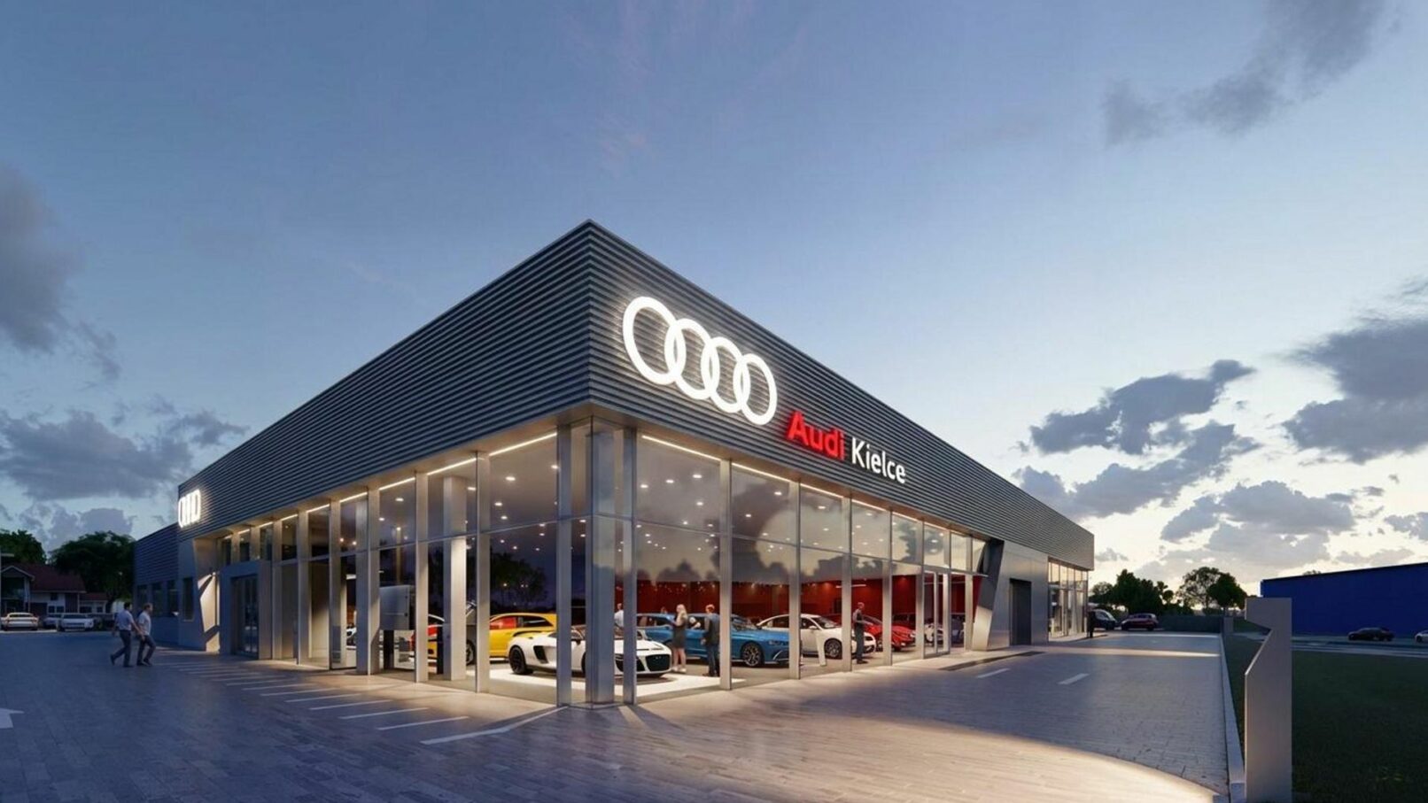 A modern Audi showroom illuminated at dusk, with a sleek glass façade showcasing various Audi models inside. The glowing Audi logo and red signage stand out against the deep blue evening sky. Luxury vehicles are parked in the foreground, with ambient lighting and clean pavement enhancing the upscale atmosphere of the dealership. Scattered clouds and fading daylight complete the twilight setting.