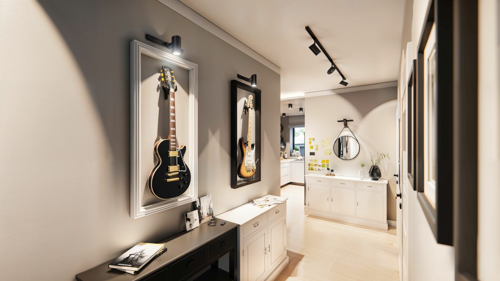 A modern hallway interior featuring framed electric guitars displayed as art under accent lighting. The space is styled with neutral tones, minimalist furniture in black and white, and light wood flooring. A round mirror, post-it wall, and monochrome decor elements add personality to the bright, creative atmosphere that transitions toward an open kitchen area. Designed by Kożuchowski Architektura & Design.